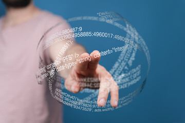 Poster - Person's hand interacts with a futuristic digital sphere showing internet data and code.