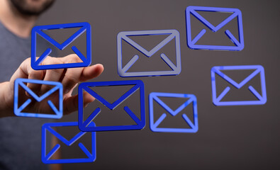 Poster - A person interacts with email icons, illustrating efficient inbox management and digital communication.