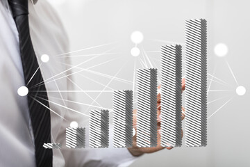 Poster - Image of a businessman showcasing an upward trending bar graph, symbolizing growth and success.