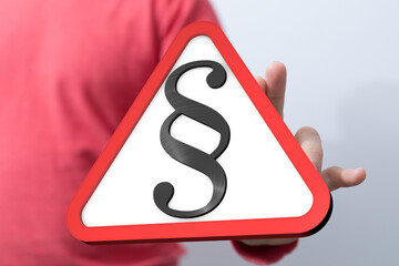 Poster - Hand holding a red triangle warning sign with a paragraph symbol.  Legal notice concept.