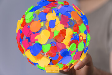 Leinwandbilder - Abstract 3D rendering of colorful speech bubbles forming a sphere, symbolizing global communication and connection.