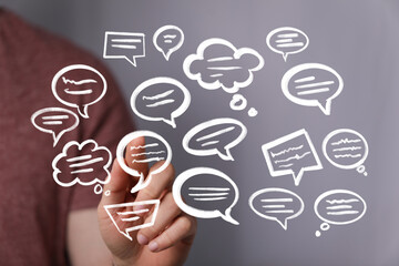 Poster - Hand interacting with digital speech bubbles,communication, conversation, social media concept.
