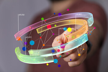 Leinwandbilder - Person interacts with a vibrant 3D data visualization, showcasing interconnected nodes and numerical values.
