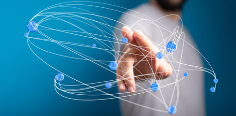 Leinwandbilder - Abstract image of a hand interacting with a network of digital nodes, representing global connection and data.