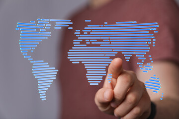 Poster - Person interacts with a digital world map, symbolizing global connectivity and networking.