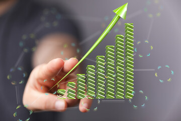 Poster - Stock photo of a hand interacting with a 3D bar graph showing upward growth.  Ideal for business, finance, and success.