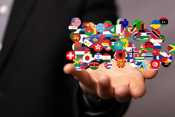 Poster - Image of diverse flags, representing international connections and global reach.