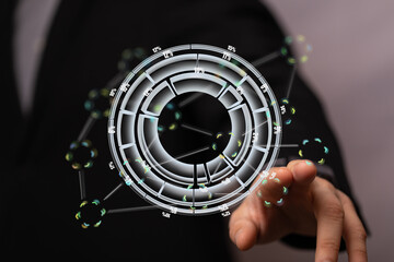 Poster - Stock photo of a businessman interacting with a holographic data visualization.