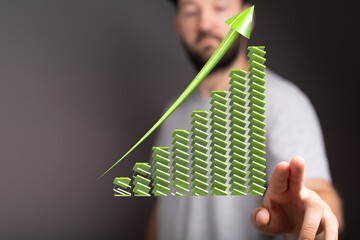Poster - Stock photo of a green upward trending graph. Represents growth, success, and progress.