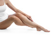 © New Africa - Woman with beautiful smooth legs after epilation on white background, closeup