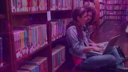 Poster - Student opening laptop in library starting group study while friend pointing screen and smiling