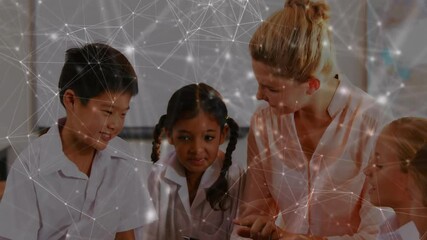 Poster - Female teacher placing tablet on desk guiding two students in digital lesson with tapping