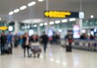 © Lull - Busy Airport Terminal Blur Background. Out of focus view of people moving through a vibrant transportation hub. Symbolizes constant motion and the energetic flow of human journeys.