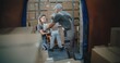 © Framestock - Outside of Logistics Warehouse: Team of Diverse Employees Unloading Delivery Truck with Cardboard Boxes, Online Orders, Purchases and E-Commerce Goods. Working in Delivery Service, Storage Facility.