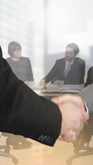 Poster - Animation of businessman and businesswoman shaking hands over group of businesspeople in office