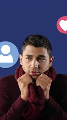 Poster - Animation of man wearing a red scarf and looking at colorful people and hearts icons