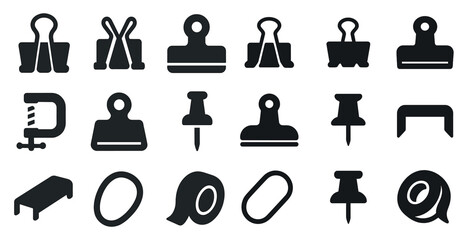 Fototapete - Collection of office supplies, including a stapler, paper clips, and a hole punch