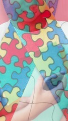 Poster - Jigsaw puzzle and ribbon icon against two diverse boys using smartphone at school