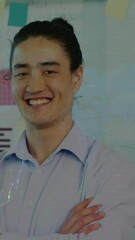 Poster - Animation of graphs over smiling asian man standing arms crossed against reports and doodles on wall