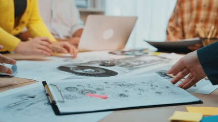 Poster - Professionals collaborate in a bright office, examining project sketches and designs. Their teamwork showcases creativity and innovation, enhancing modern business processes. SACTR