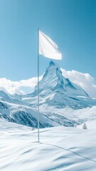 Wall Mural - White flag on snowy landscape with majestic mountain background