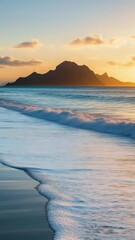 Poster - Sunset over serene ocean waves with silhouetted island mountains
