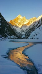 Poster - Golden sunset illuminating snowy mountain with icy river reflection