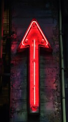 Poster - Red neon arrow sign on textured wall in dim urban setting