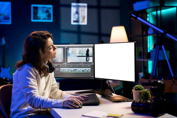 Poster - Videographer using professional software on mockup PC to create visual effects for video projects. Expert using post production techniques to edit raw clips footage on isolated screen monitor