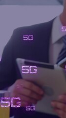 Poster - Animation of 5g texts over caucasian business people using smartphone