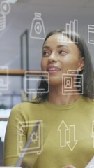 Poster - Animation of icons over diverse business people working at office