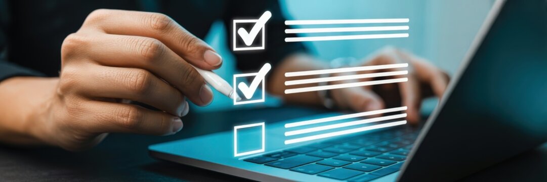 Person marking checkboxes on a laptop screen.