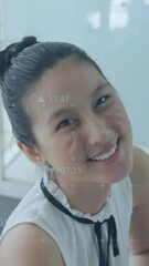 Aufkleber - Animation of icons over asian businesswoman in office