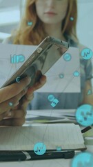 Poster - Animation of globe of connections with icons over diverse businesspeople using electronic devices
