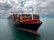 © SHUTTER DIN - logistic cargo container ship sailing in sea to import export goods and distributing products to dealer and consumers across worldwide,