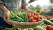 © Chineewan Somsap - Fresh vegetables in woven basket, including green peppers and ripe tomatoes, evoke sense of healthy living and vibrant markets