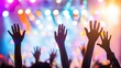 © mariyana_117 - Concert Crowd Enthusiasm: Raised Hands in Colorful Light