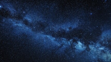 Vast expanse of the milky way galaxy with countless stars and nebulae in deep blue hues