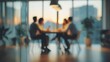 © Ahmed - Blurred soft of people meeting at table business people talking in modern office