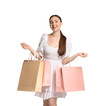 © New Africa - Positive woman with shopping bags on white background