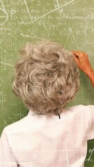 Poster - Animation of floating mathematical equations over teacher writing on blackboard
