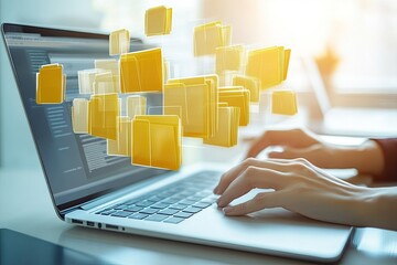 Poster - Close-up of a person working on a laptop.  Hovering yellow folders appear above the screen.  Modern, digital workspace