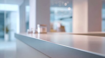 Poster - Modern minimalist interior design with sleek white surface and bright natural light.