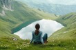 © HO - Nature travel concept, woman resting near alpine lake, lush green hills, adventure feel