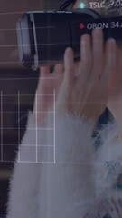 Poster - Animation of financial data processing over woman wearing vr headset
