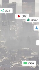 Poster - Animation of multiple social media icons floating against aerial view of cityscape