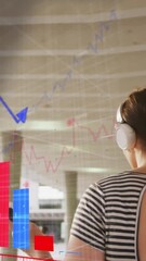 Poster - Animation of statistical data processing against rear view of a woman walking at corporate park