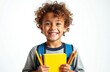 © Vadym - Happy young boy with curly hair and school supplies. Child smiling joyfully holding yellow notebook with pencils. Ready for school, elementary education, kid portrait. Pure childhood emotions.