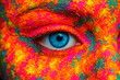 © pika - Vibrant Painted Eye: Close-Up of Colorful Face Paint on Eye
