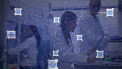 Poster - Research scientists picking up tablet after hexagon network overlay appearing and analyzing data